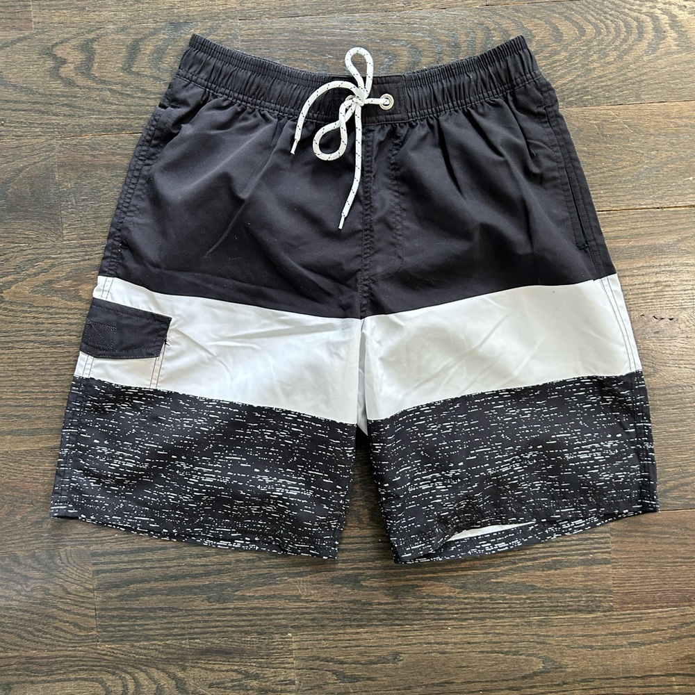 Men’s size Large swim trunks. Never worn. Tags removed. Brand new